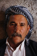 Elderly Kurdish Man in traditional headdress. [For similar images search for Ethnic Faces]