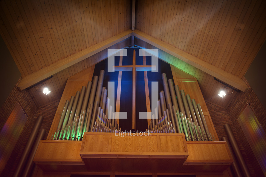cross and organ pipes