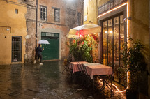 rain and outdoor seating in Greece 