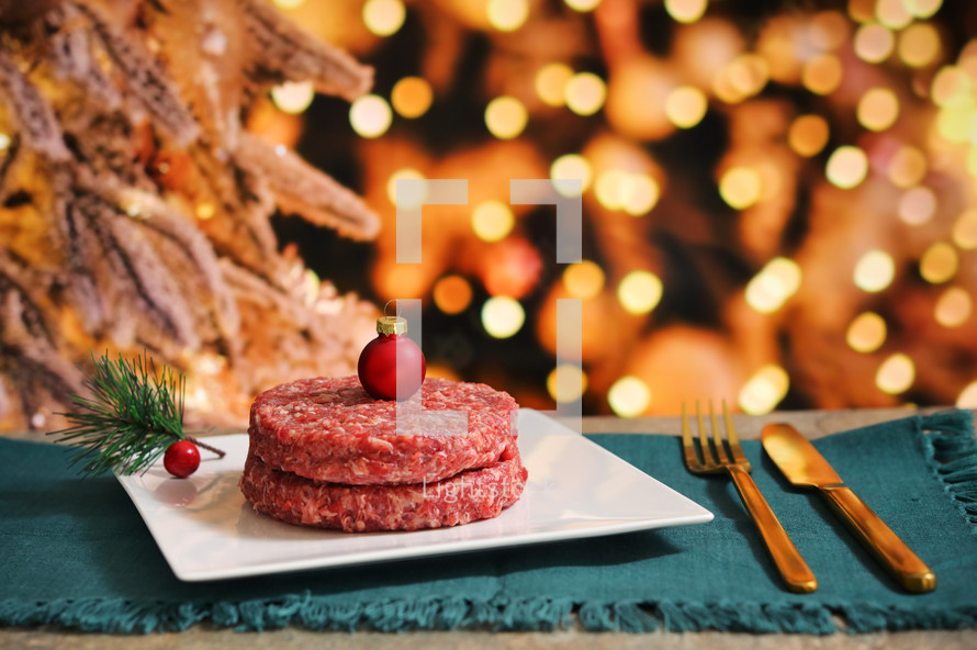 Meat patties made to look like a desert with Christmas decor