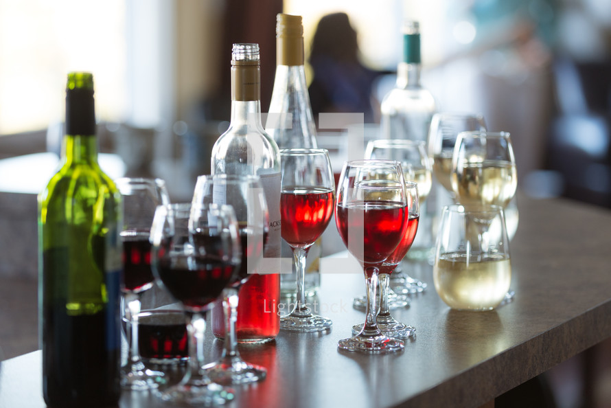 wine glasses on a bar 