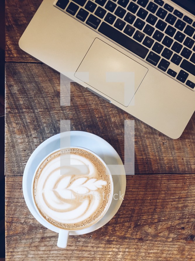 laptop keyboard and latte 