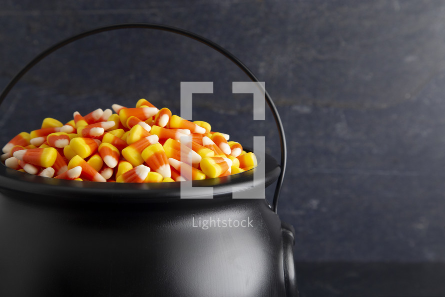 candy corn in a cauldron 