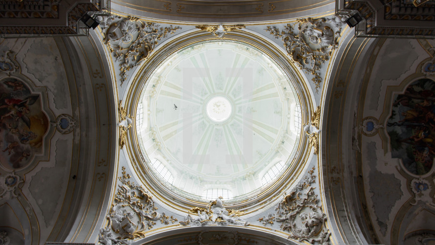 Dome of a church with windows where the light of the holy spirit enters
