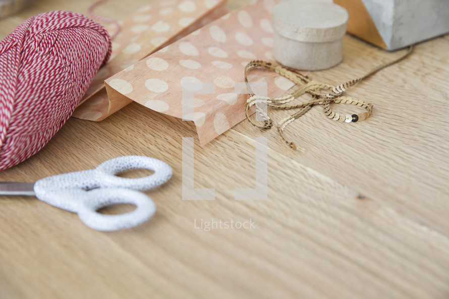 scissors, yarn, ribbon, tissue paper 