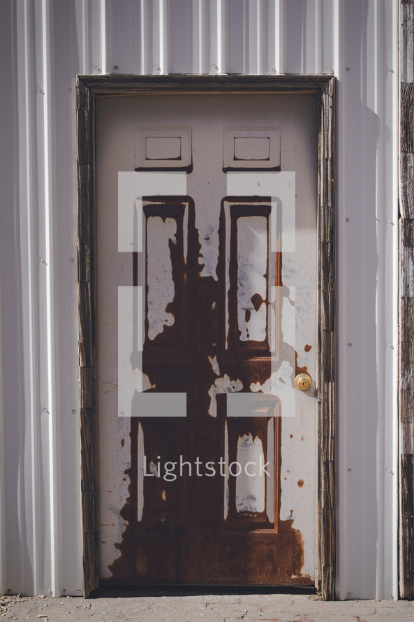 paint peeling on an old door 