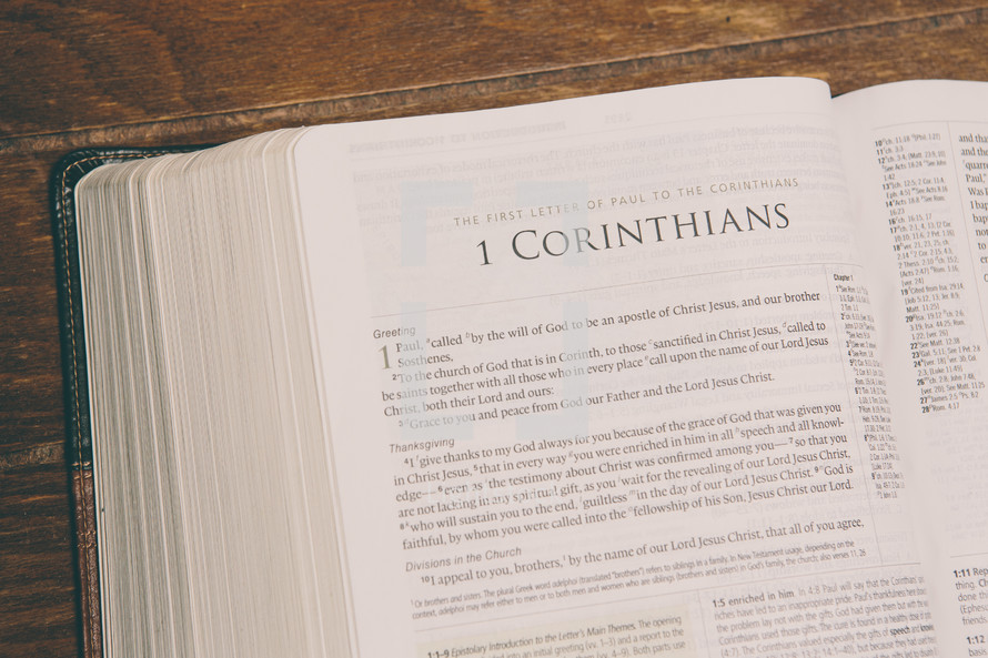 Bible opened to 1 Corinthians 