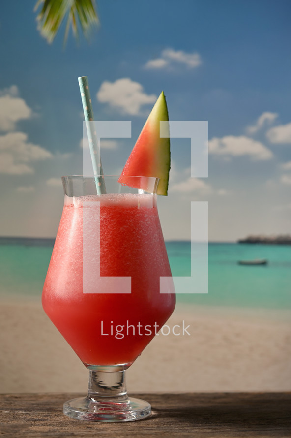 A Glass Of Freshly Squeezed Fresh Watermelon Juice on Beach