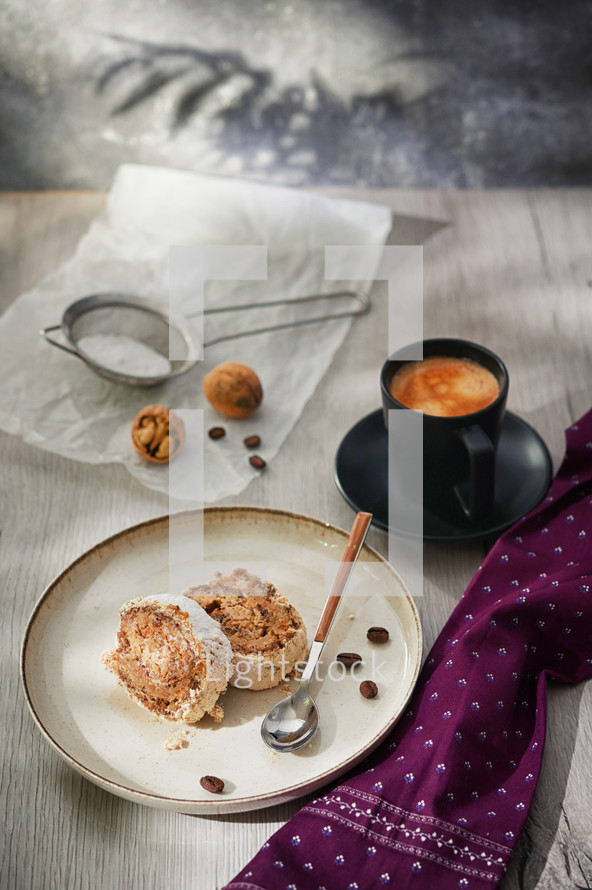 Coffee and treat with purple napkin