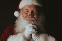 Santa with praying hands 
