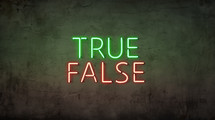 A neon sign with the words "true" and "false" on a grunge background. 
