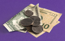 money on a purple background 