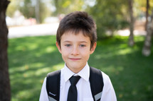 portrait of a child in dress clothes 