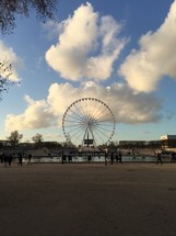 ferris wheel under a blue sky 