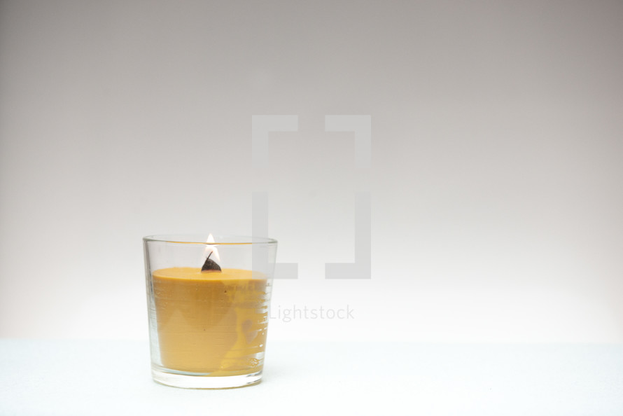 candle agains a white background 