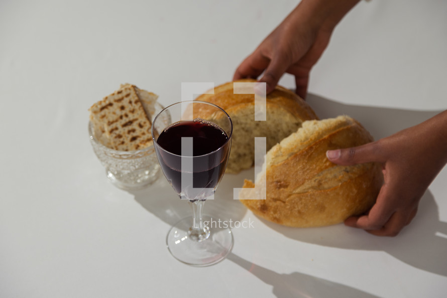 communion bread and wine on a white background 