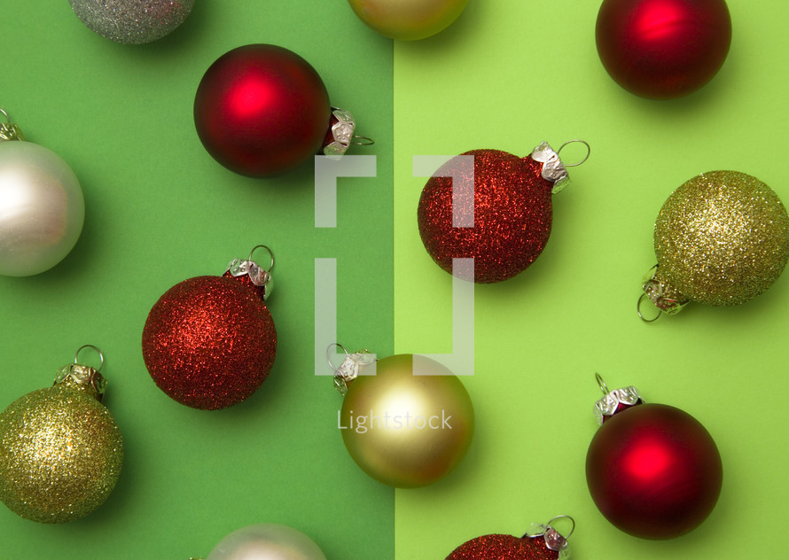 Christmas ornaments on green background 