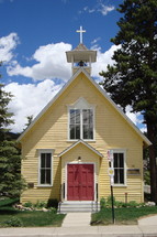 Small yellow rural church house