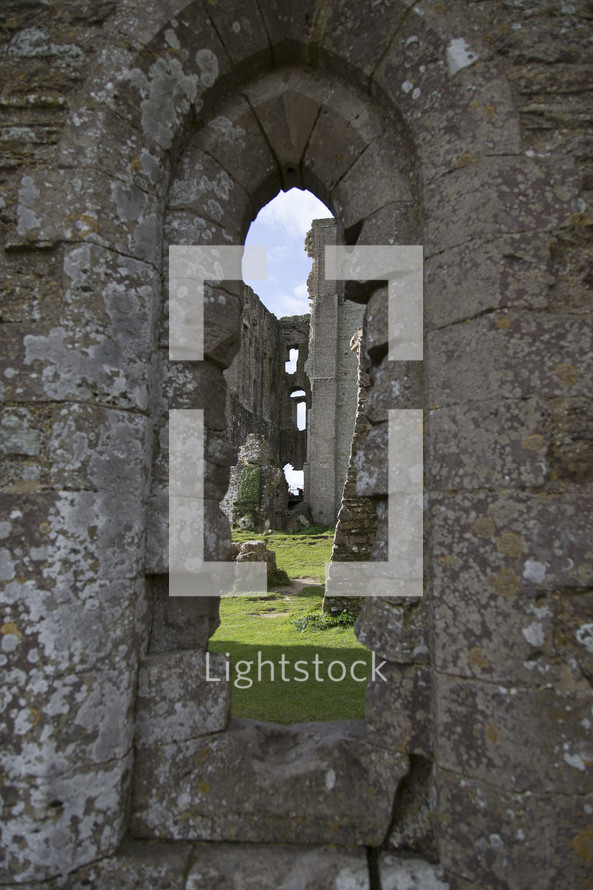 arch windows in a castle ruins 