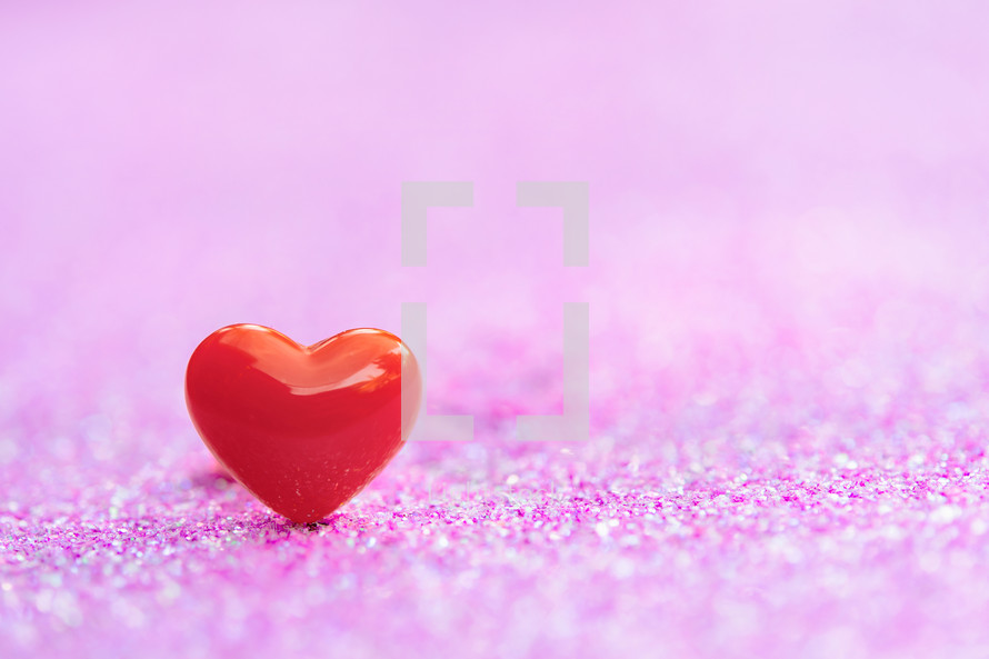 red heart on a pink background 