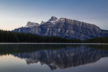 mountain peak across a lake 