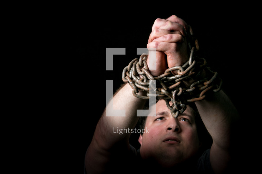 a man in chains 