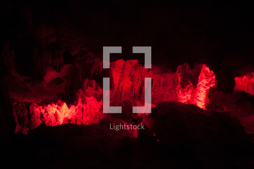 red glowing light in a cave