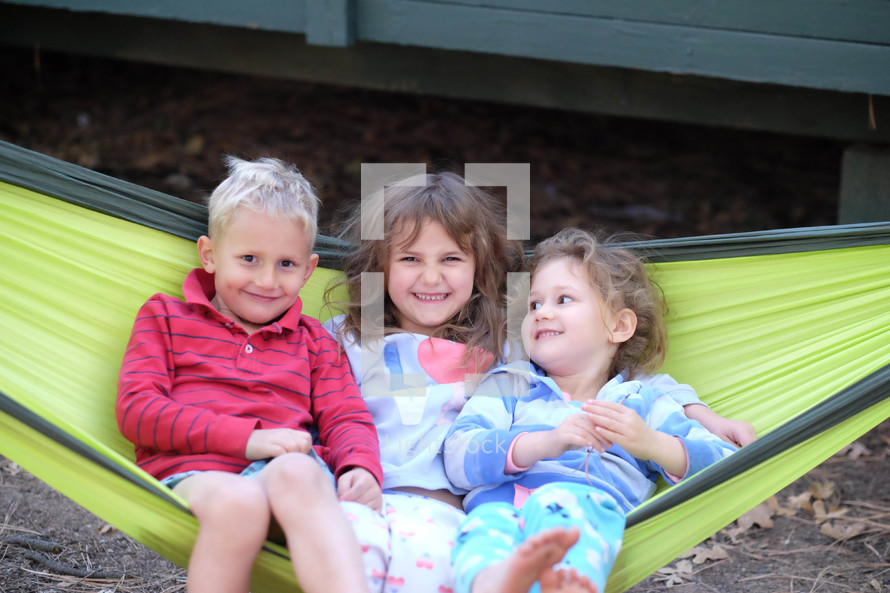 siblings in a hammock 