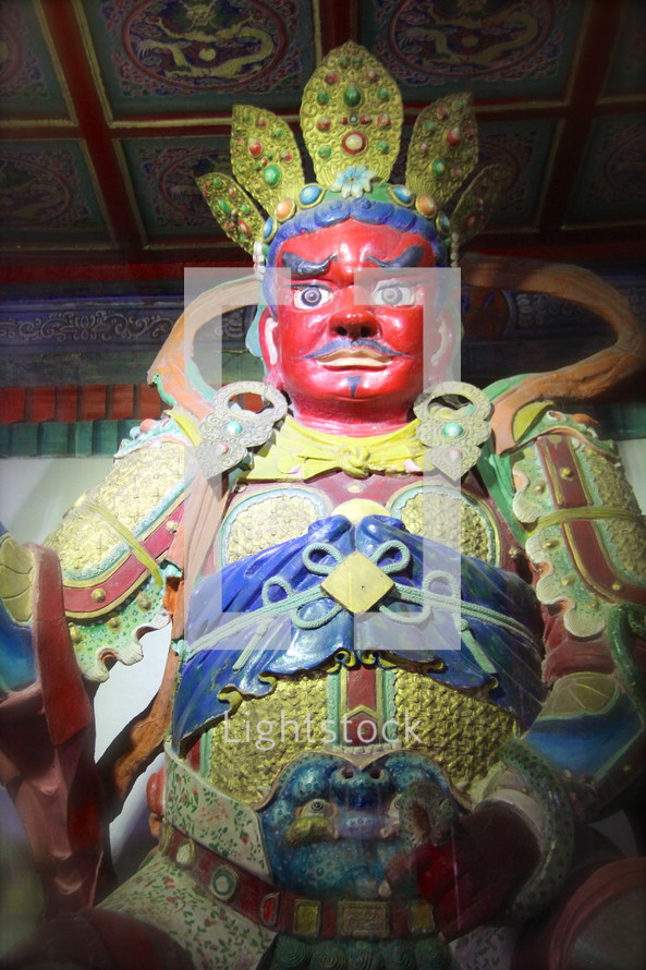 Ornate Asian statue.