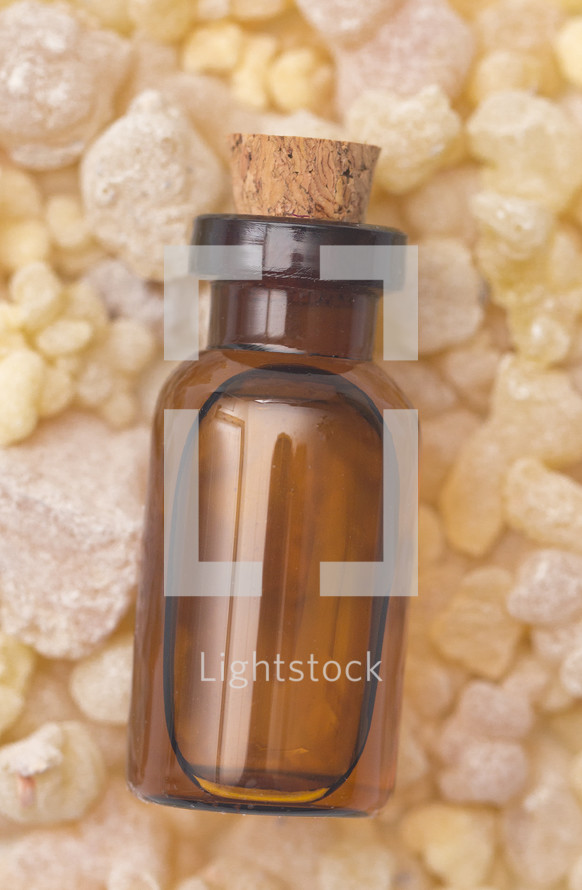 Frankincense Essential Oil in a Rustic Corked Bottle