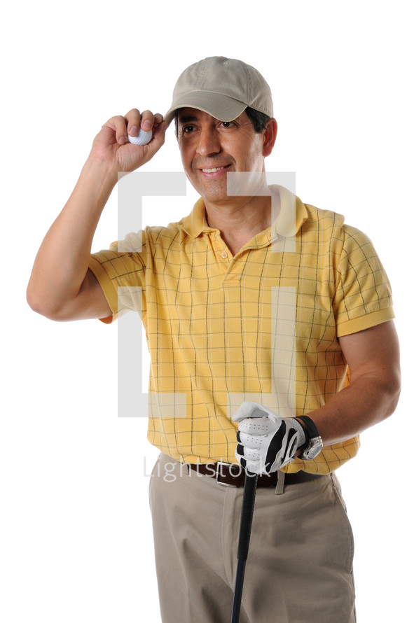 Golfer in golfing attire with club and golf ball.