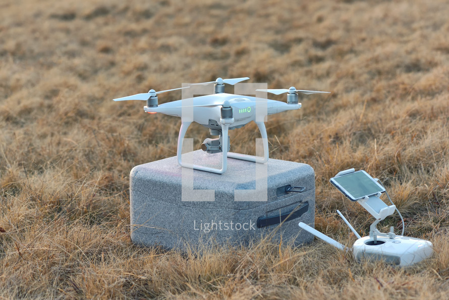 Drone quadcopter and a flight controller with smartphone