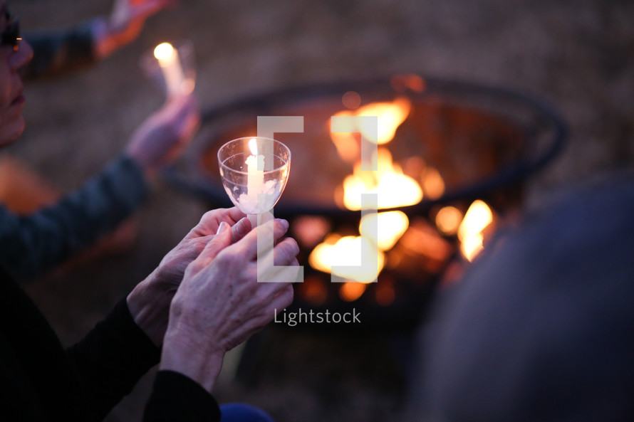 candlelight service around a fire pit 