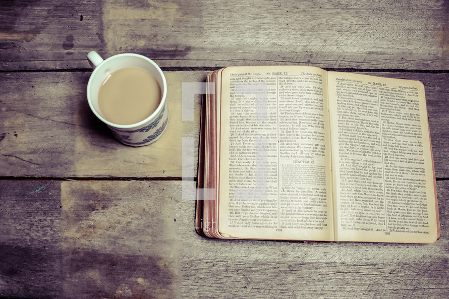 coffee mug and opened Bible 