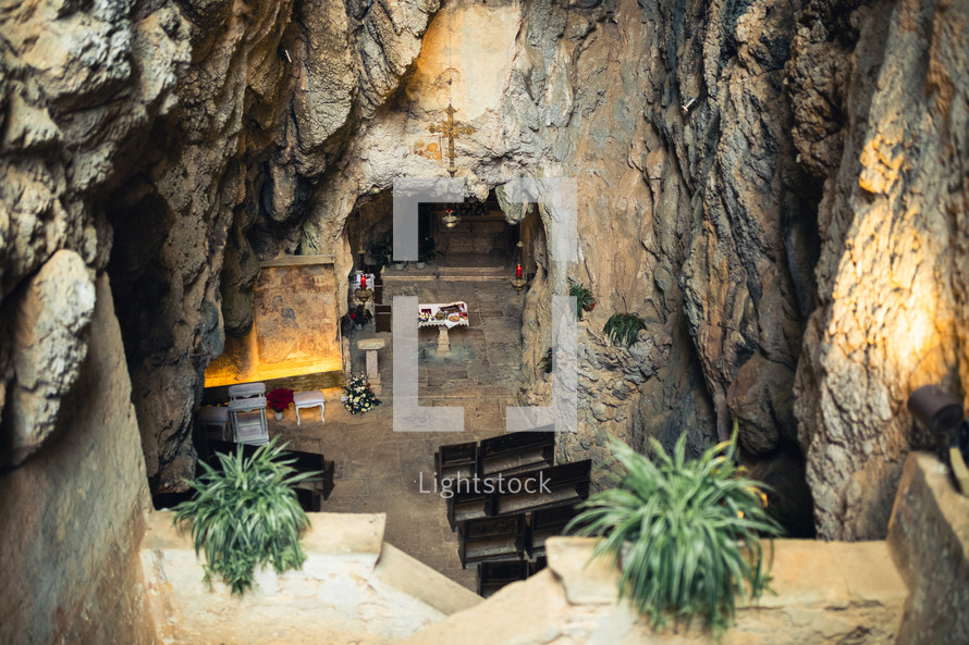 Ancient Catholic church located in a natural cave