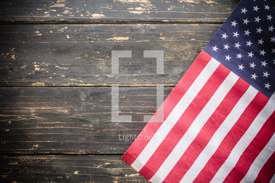 American flag on a black wood background 