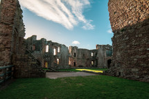 Old Medieval church in UK. Medieval fortress. The ruins of raglan castle in Monmouthshire wales. Raglan Castle – Wales, United Kingdom.	