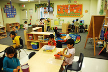 children playing indoors at daycare 
