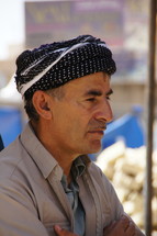 Kurdish Man with traditional headdress 