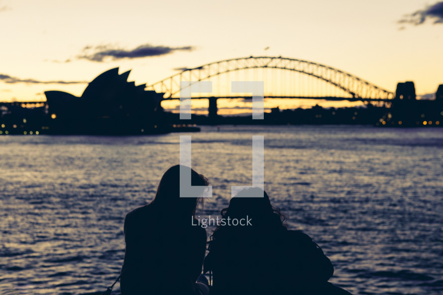 women looking at Sydney Harbour Bridge