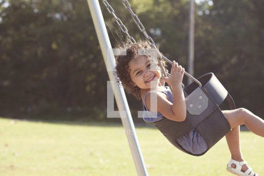 child on a swing 