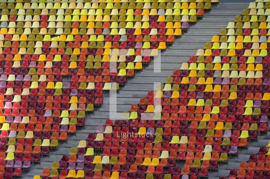 Colorful Rows Of Seats At Empty Open Air Stadium