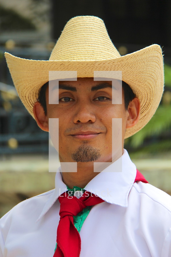 Honduran man in a cowboy hat