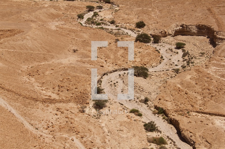dry river bed in desert landscape 