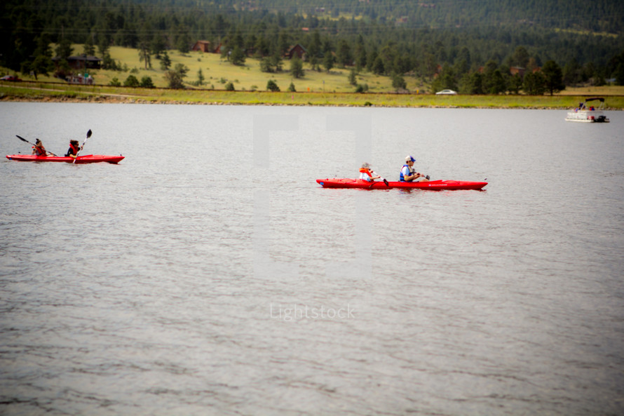 paddling in kayaks 