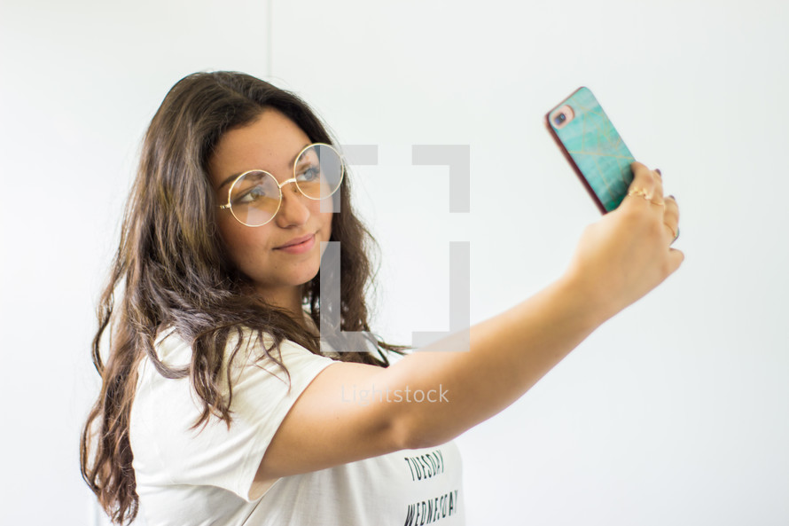a girl taking a selfie 