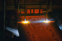 Closeup Gas cutting of the hot metal plate