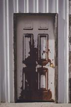paint peeling on an old door 