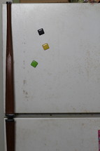 magnets on an old refrigerator 