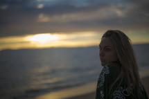 woman at the beach at sunset 